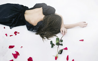 girl-with-rose-heart-broken-after-left-alone-in-love-image